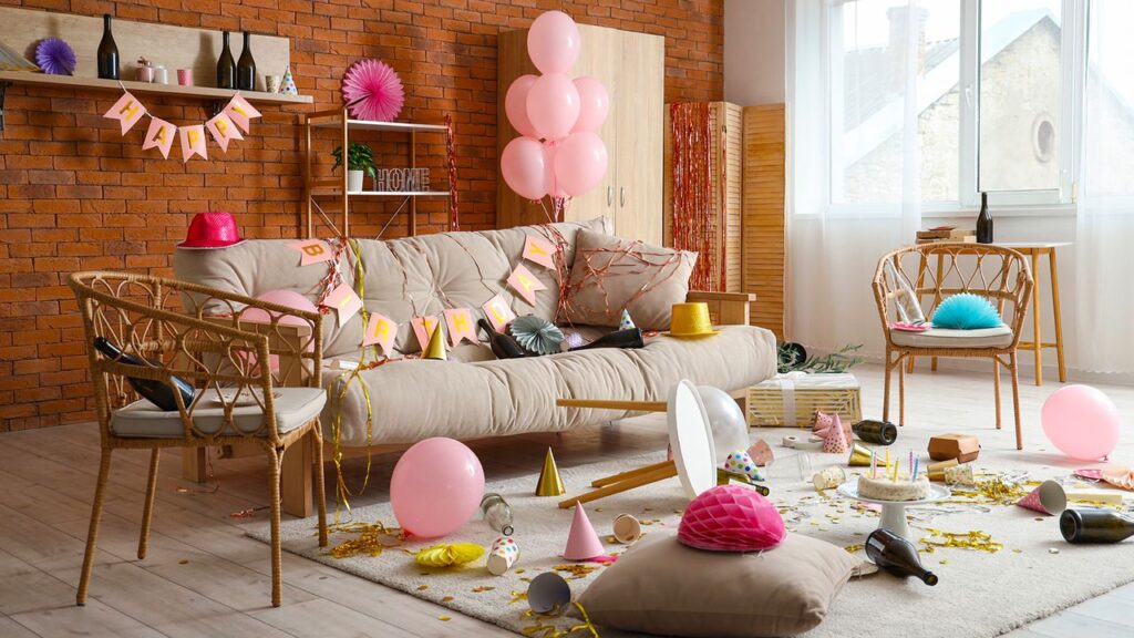 Interior,Of,Messy,Living,Room,After,Birthday,Celebration,With,Sofa,