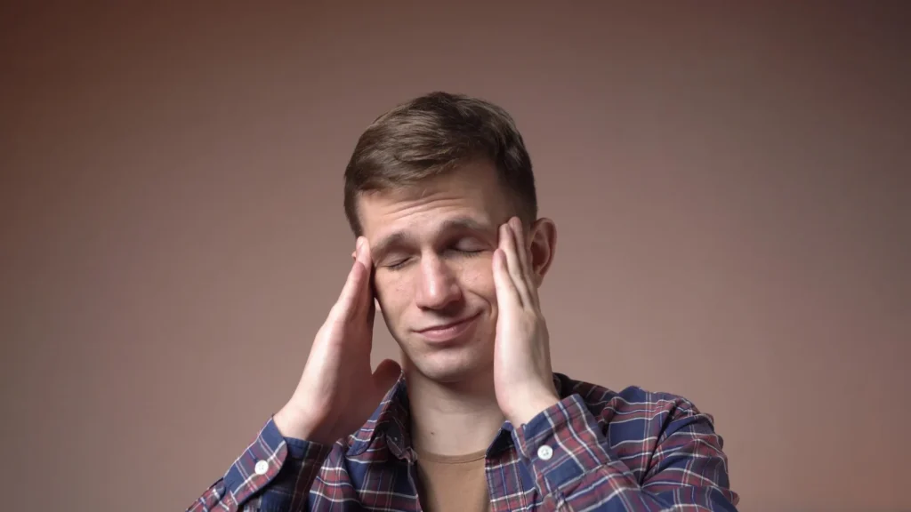 headache-migraine-stressed-young-man-massages-head