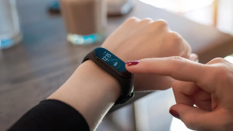 woman-pointing-fitness-tracker